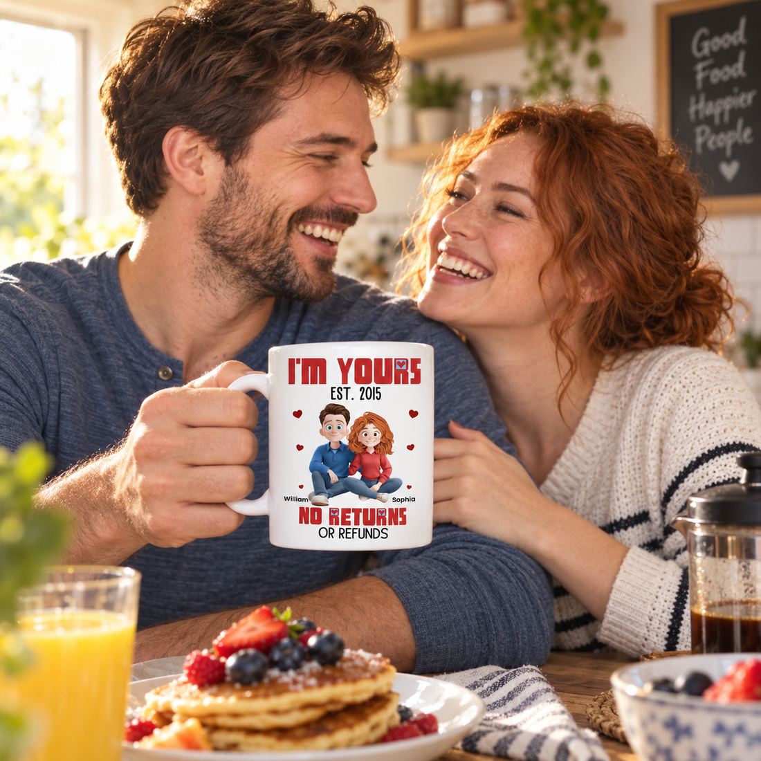 Couple laughing at breakfast with a personalized I'm Yours cartoon couple mug