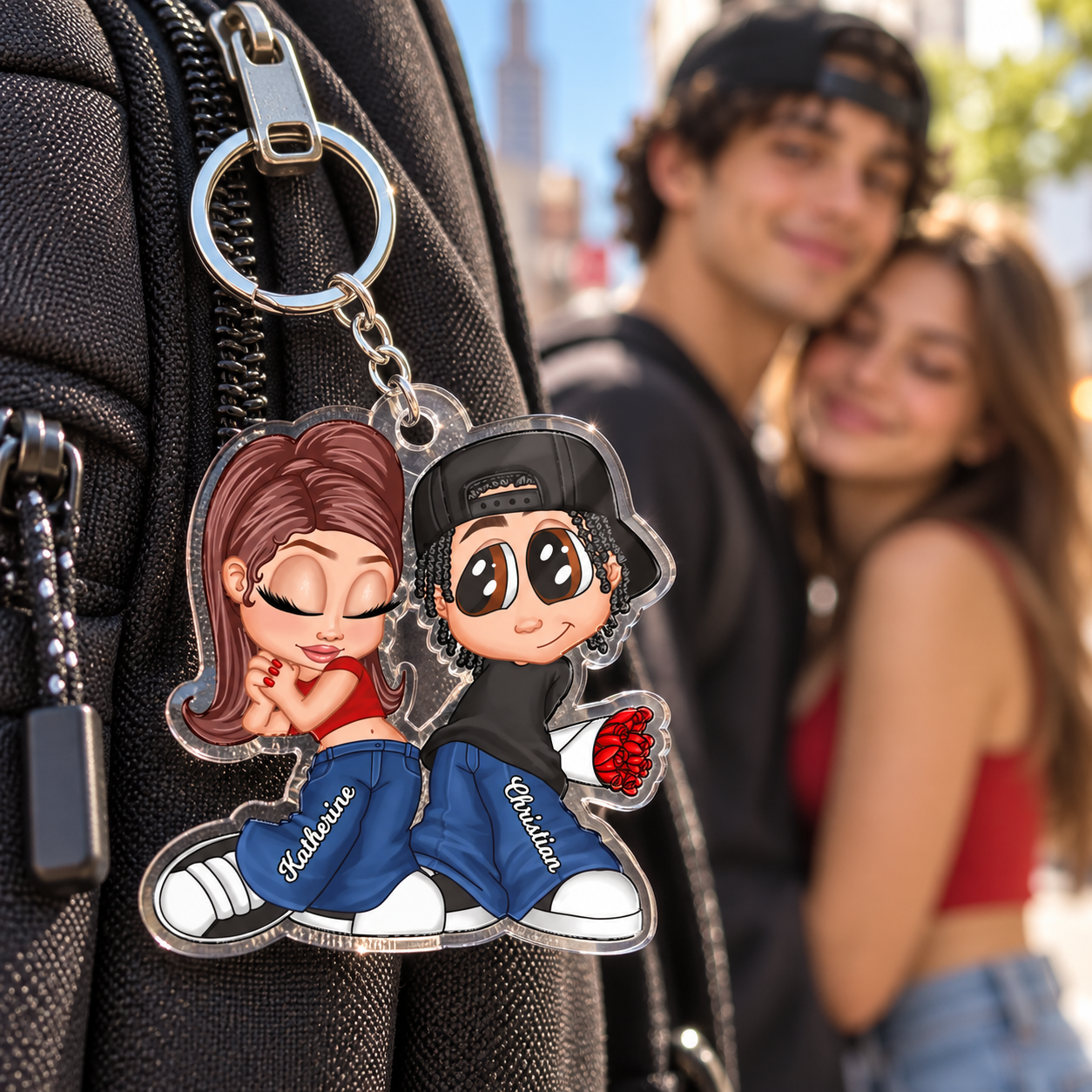 Y2K couple acrylic keychain with custom names clipped to a backpack, couple behind