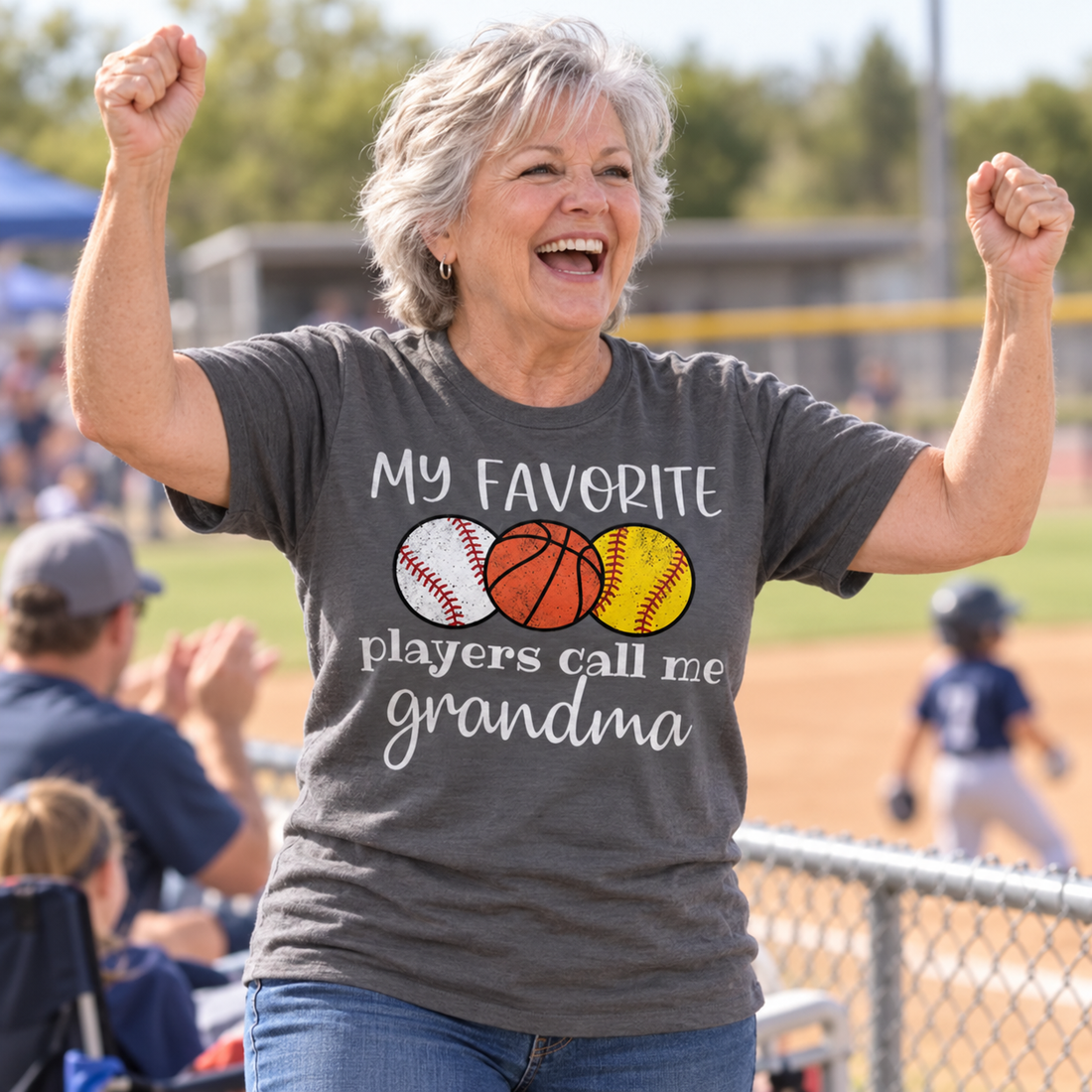 Grandma wearing the My Favorite Players Call Me Grandma t-shirt cheering at a kids ballgame