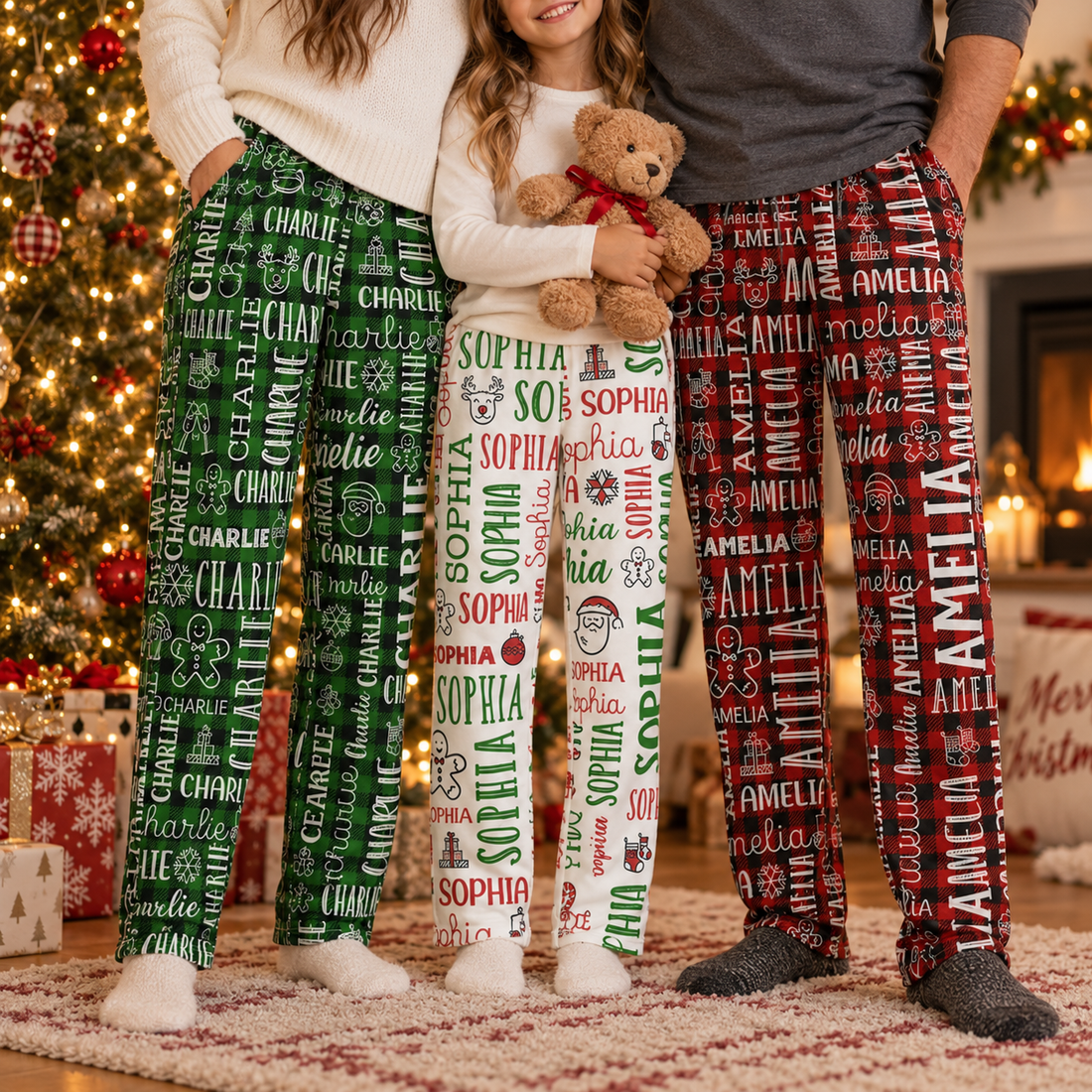 Family wearing personalized all-over name print Christmas pajama pants by the tree