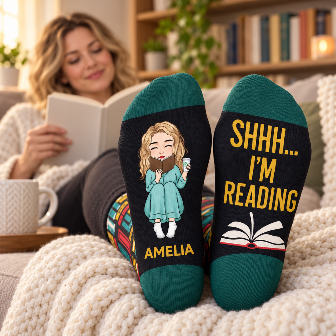 Woman reading on a couch wearing personalized Shhh I'm Reading crew socks with name Amelia