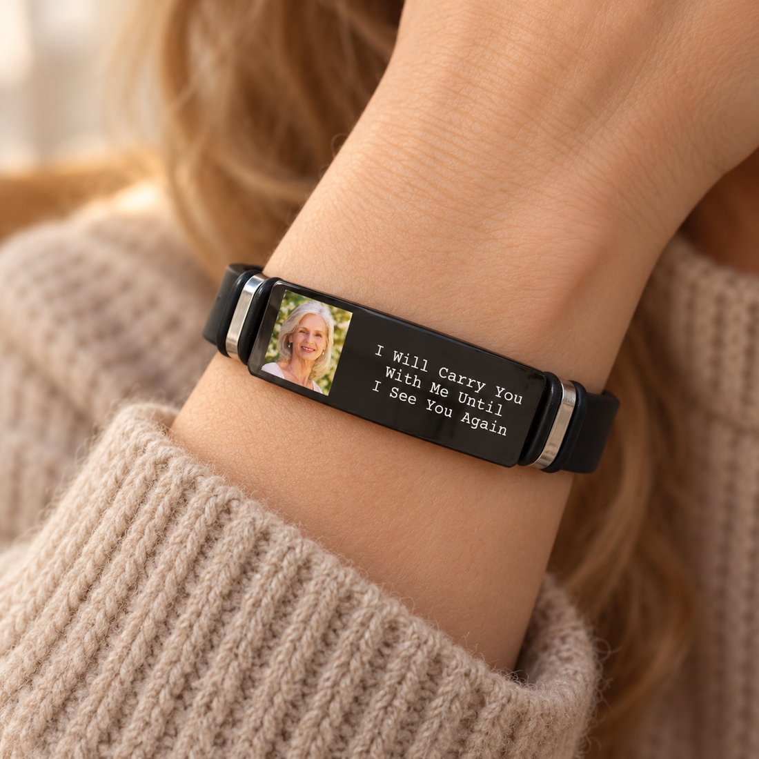 Woman wearing a personalized memorial engraved photo bracelet with a cozy sweater