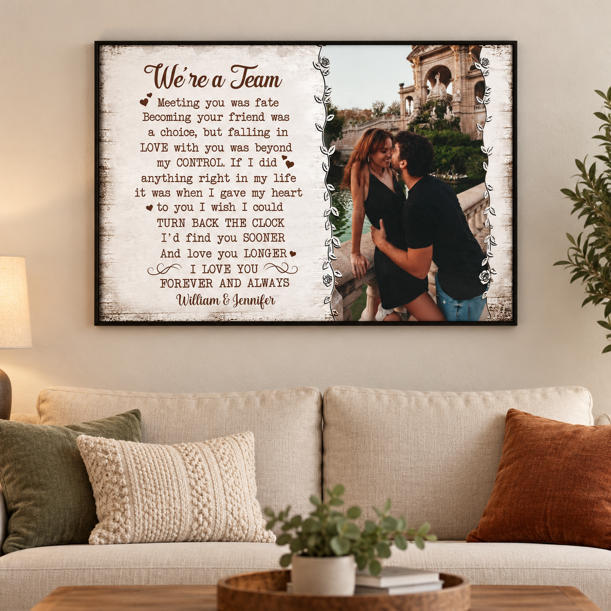 Custom We're A Team couple poster hung above a sofa in a living room