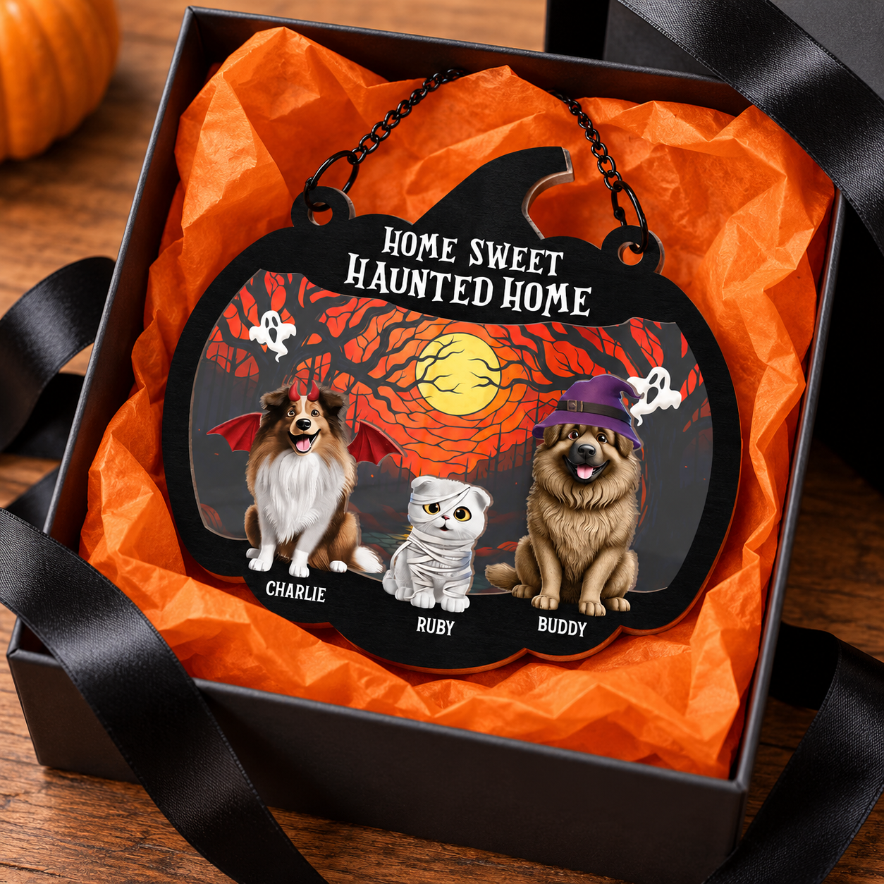 Personalized Halloween pet lover suncatcher ornament in a gift box with orange tissue and black ribbon