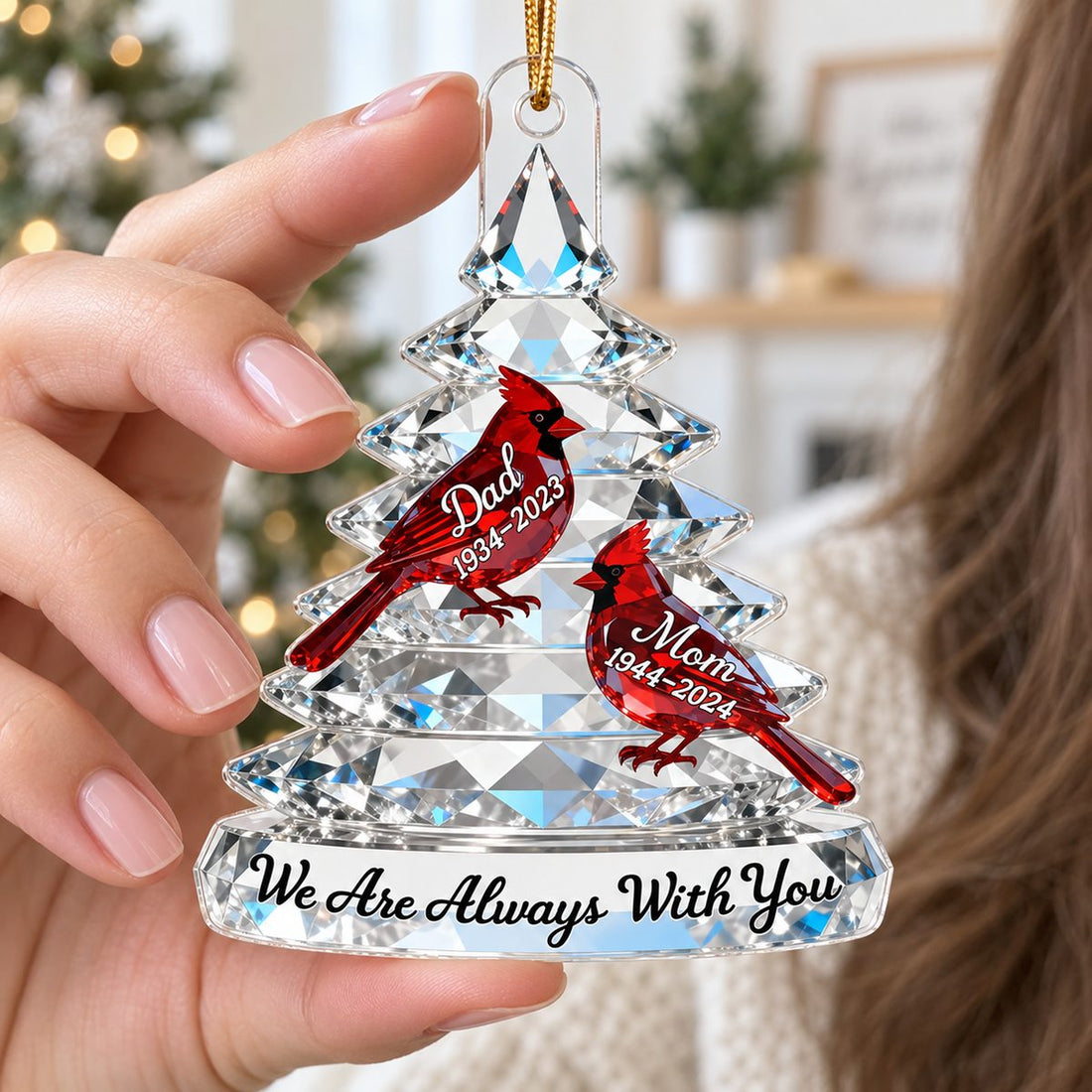 Close-up detail of the flat printed surface of the Memorial Tree Cardinals Christmas acrylic ornament.