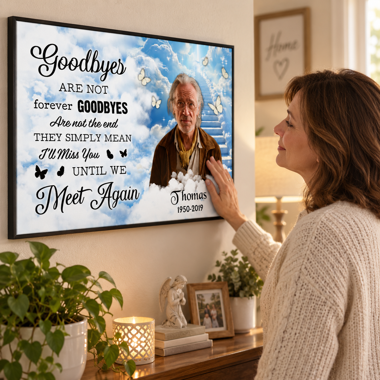 Woman touching a personalized Until We Meet Again memorial canvas of her late father