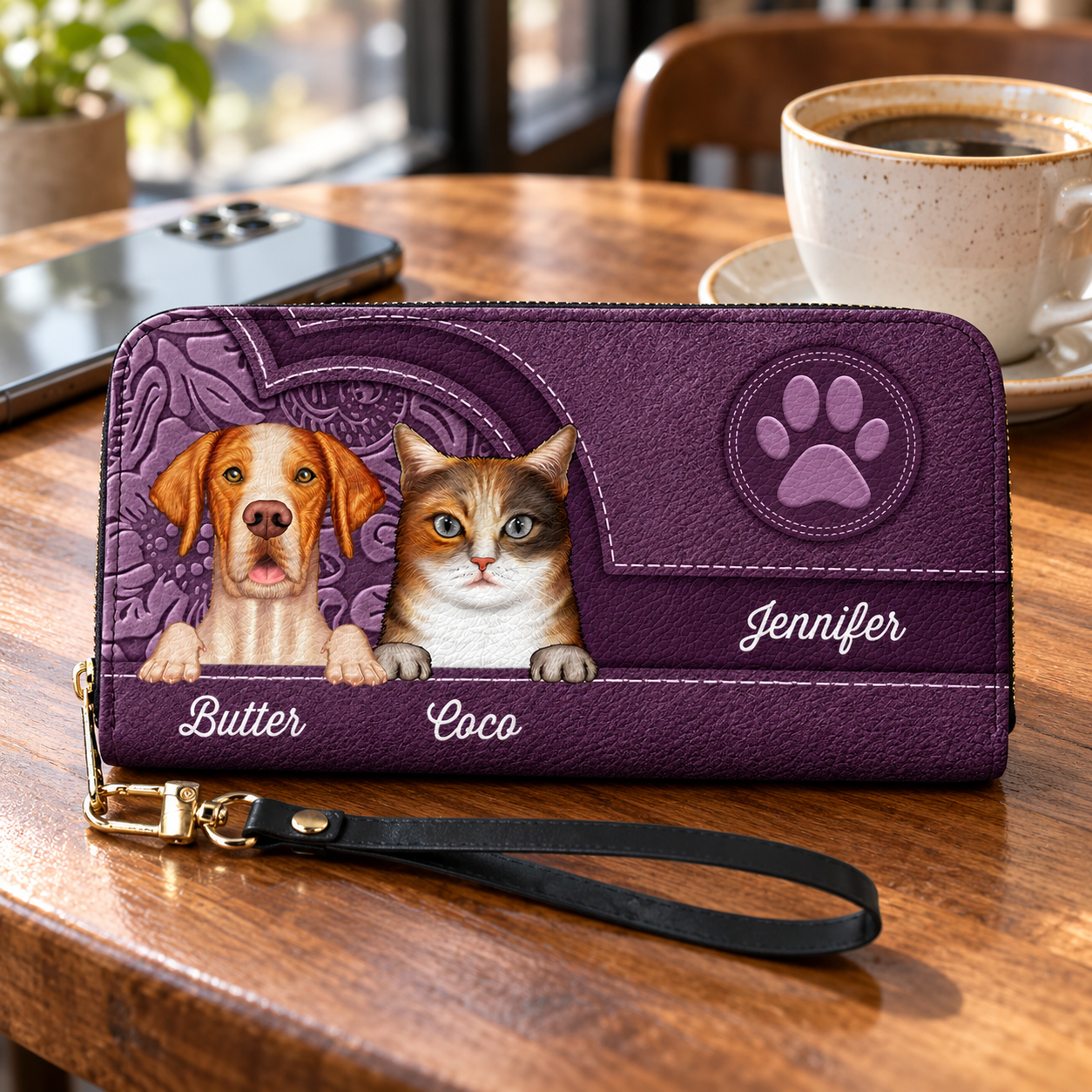 Personalized purple leather long wallet with dog and cat names on a cafe table