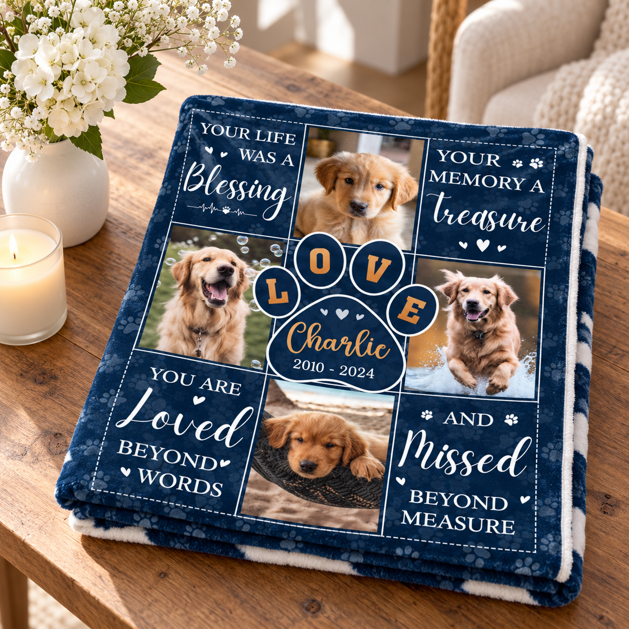 Folded Your Life Was A Blessing pet memorial photo blanket on a table beside white flowers and a candle