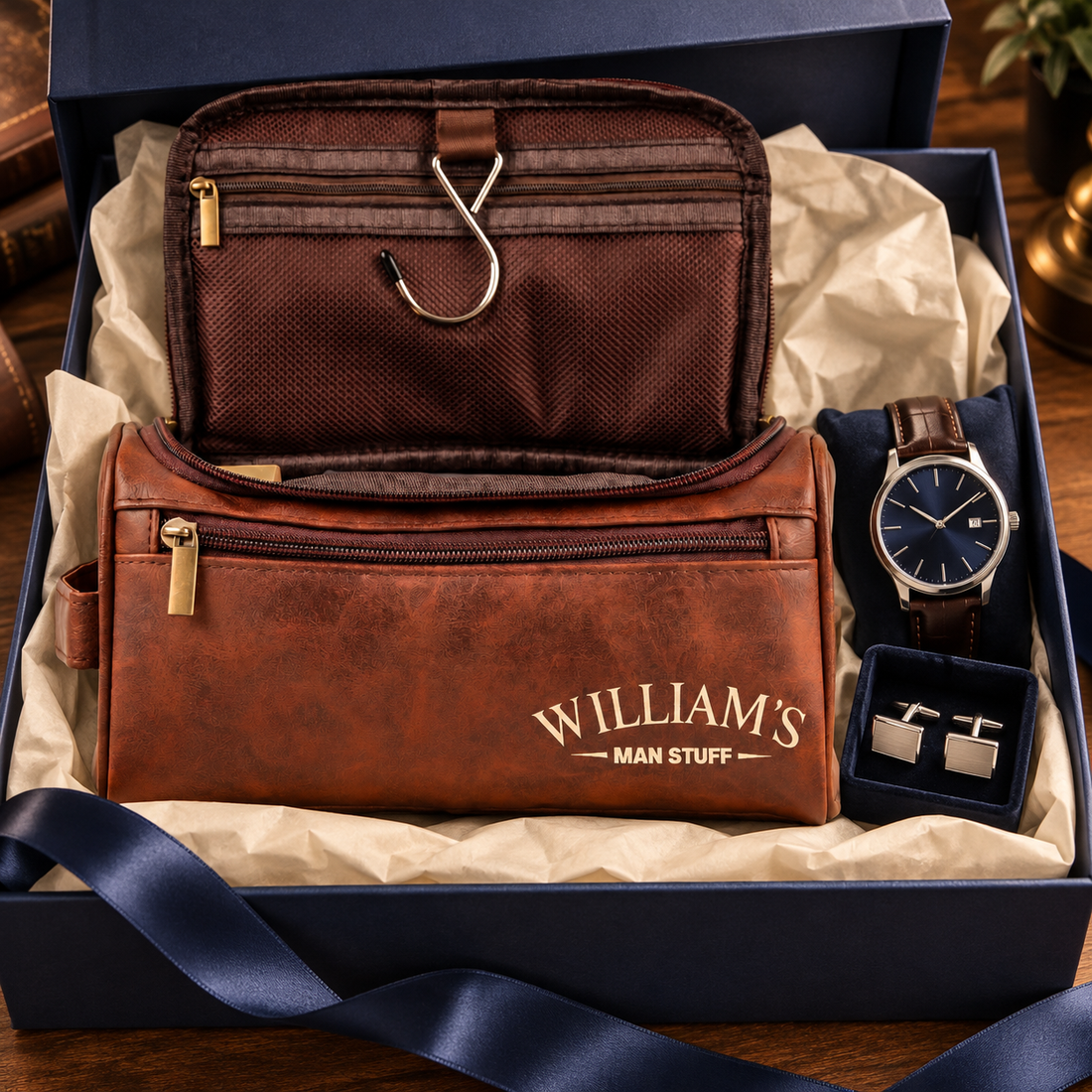 Custom leather toiletry bag in a gift box with tissue, ribbon, a watch and cufflinks for Father's Day