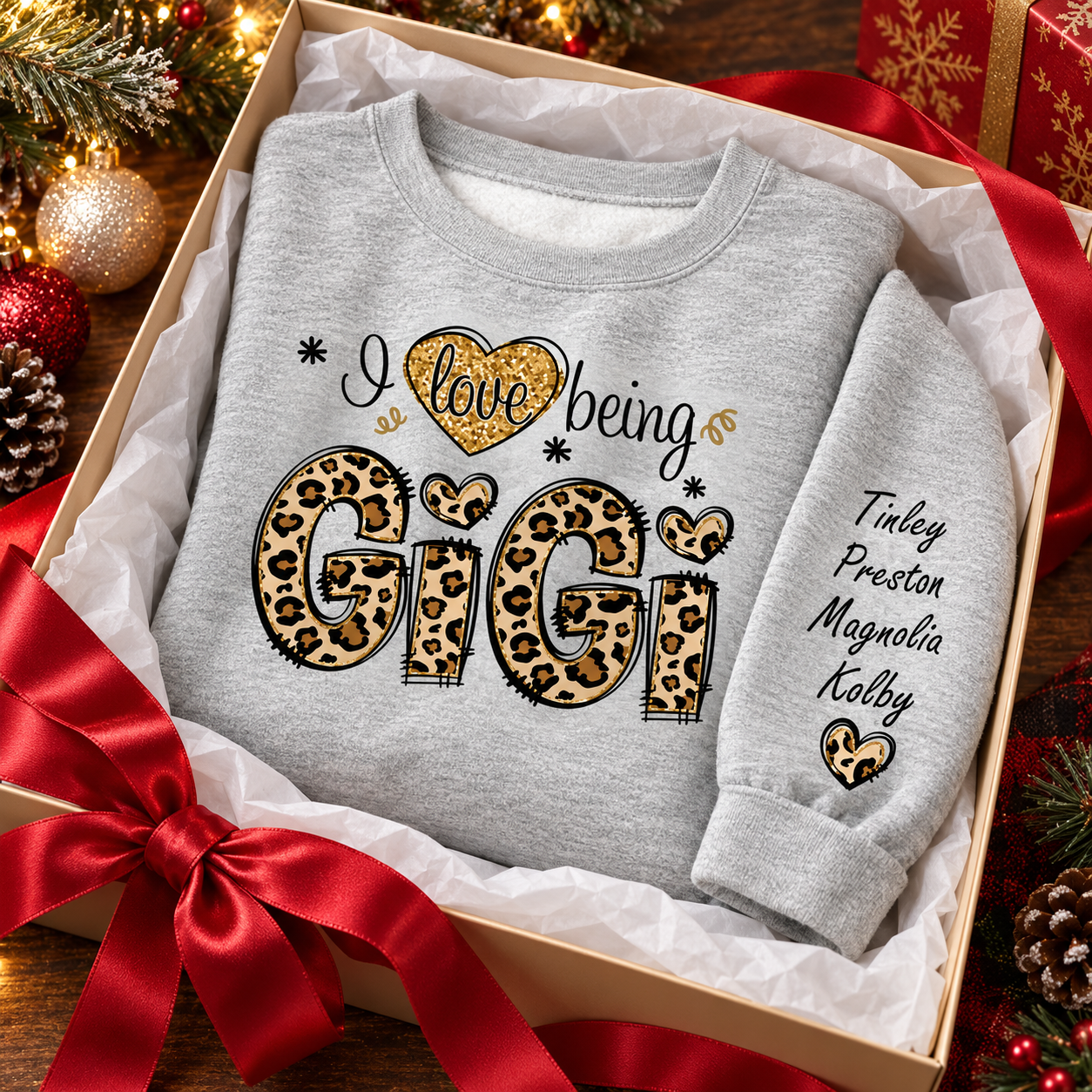 Custom I Love Being GiGi leopard sleeve sweater in a gift box with red ribbon