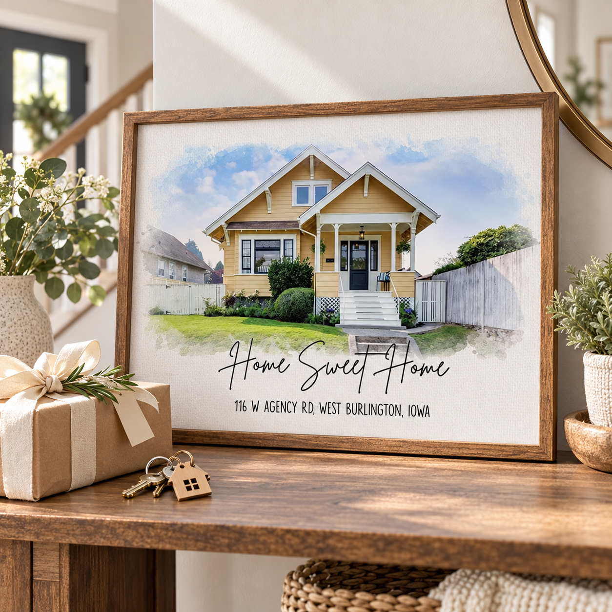 Custom watercolor house portrait Home Sweet Home poster on a console table with a gift bow and house keys