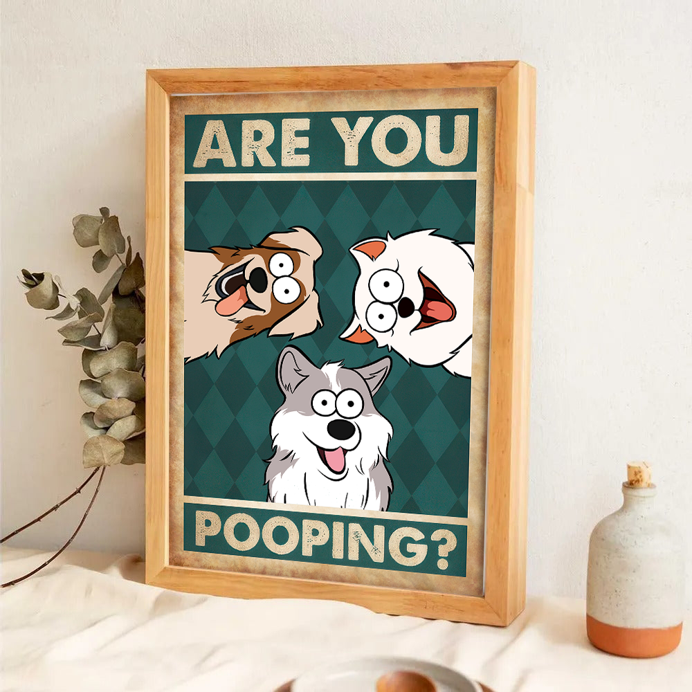 Personalized Are You Pooping? poster, a woman hanging the framed print on a wall