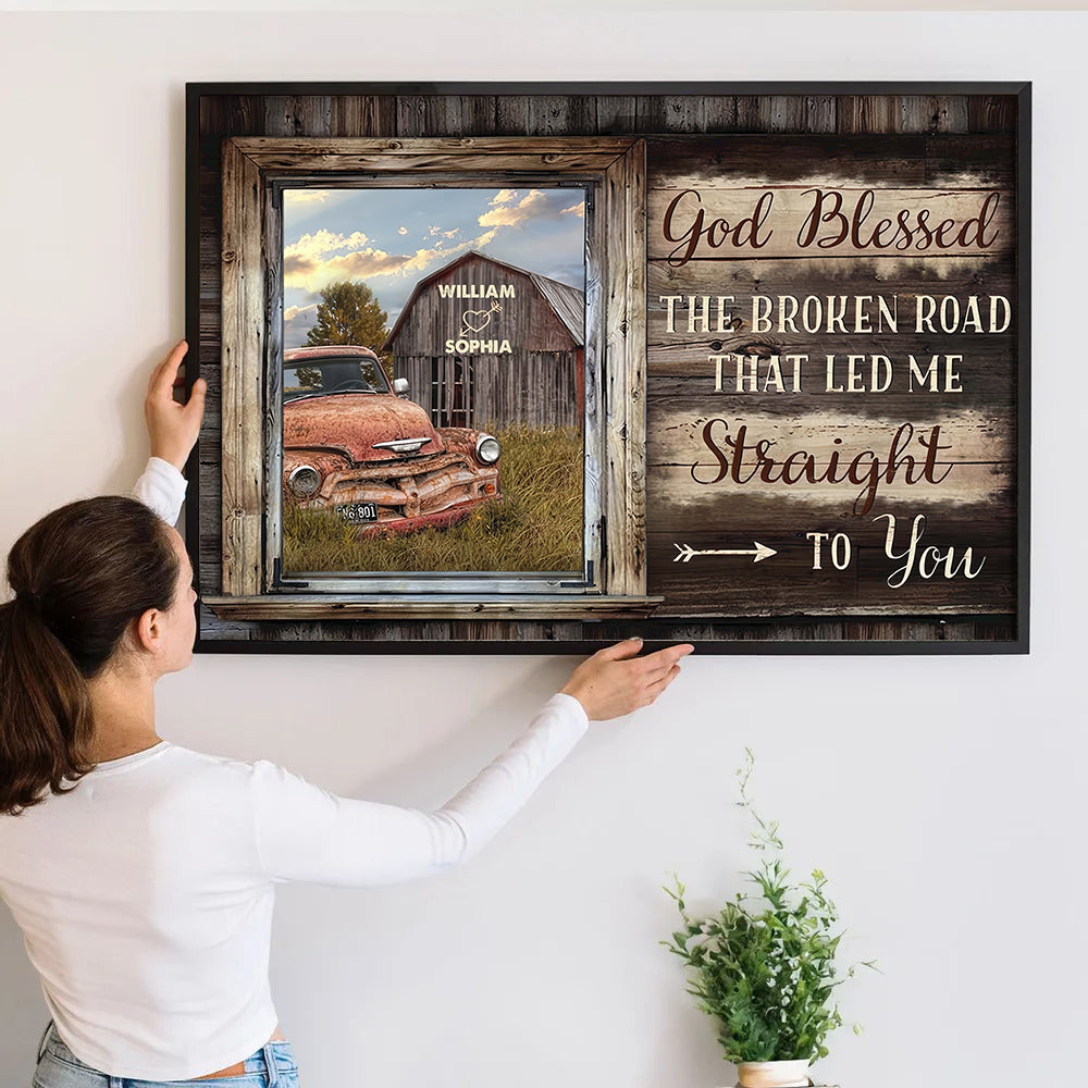 Personalized God Bless The Broken Road That Led Me Straight To You canvas print, a woman hanging the framed print on a wall