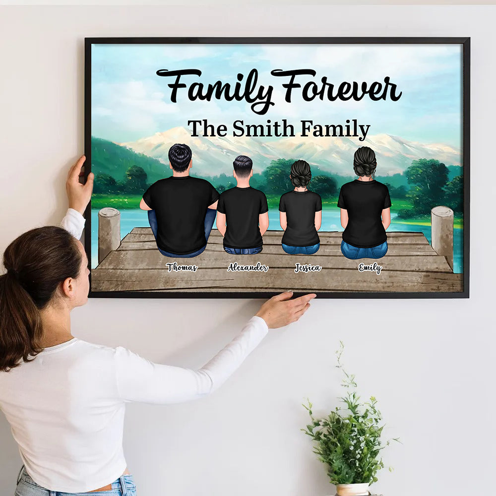 Custom Family Sitting poster, a woman hanging the framed print on a wall