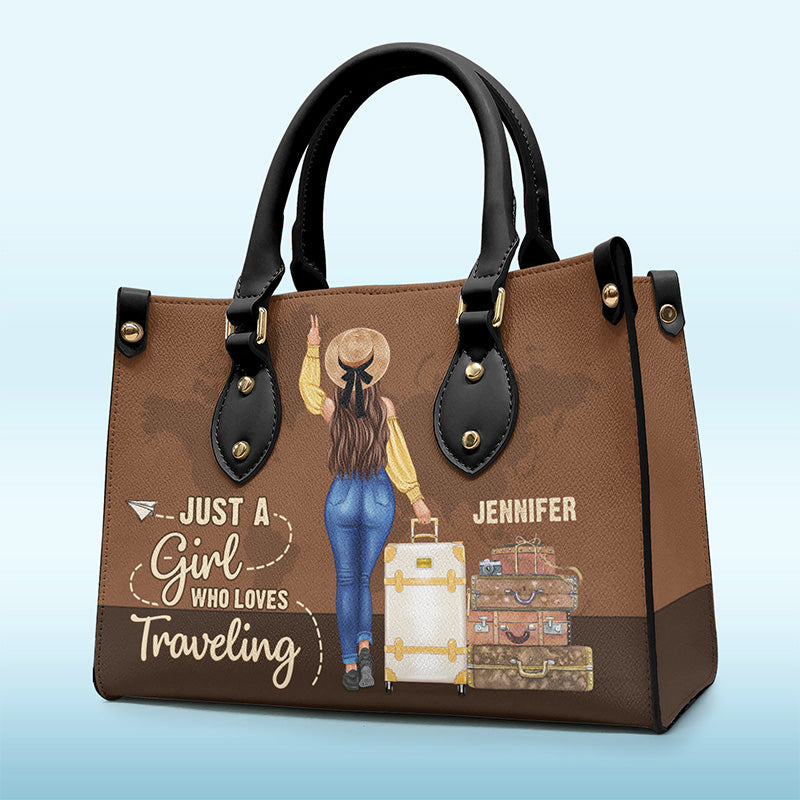 Personalized Just A Girl Who Loves Traveling leather handbag, front view with name options