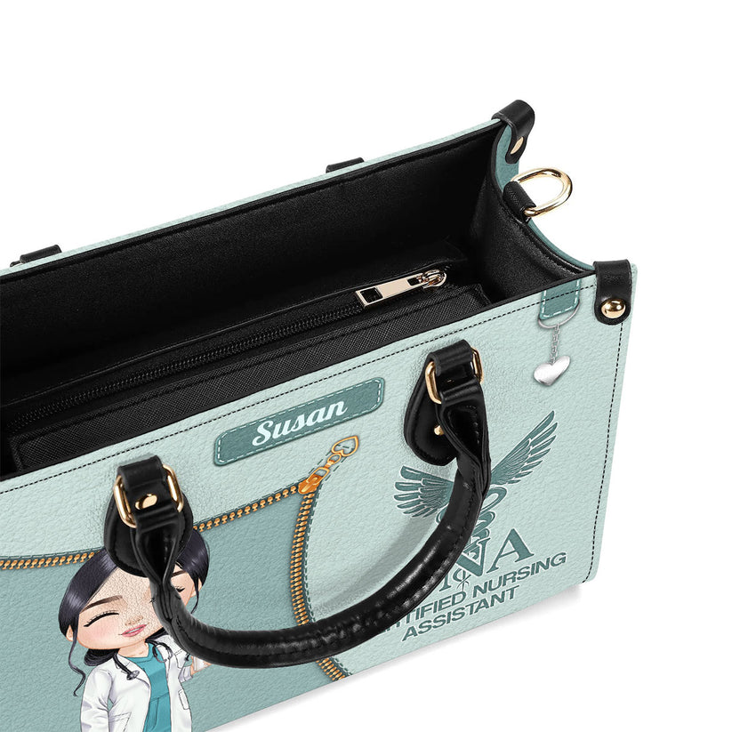 Registered nurse watercolor leather handbag with name, carried on the shoulder