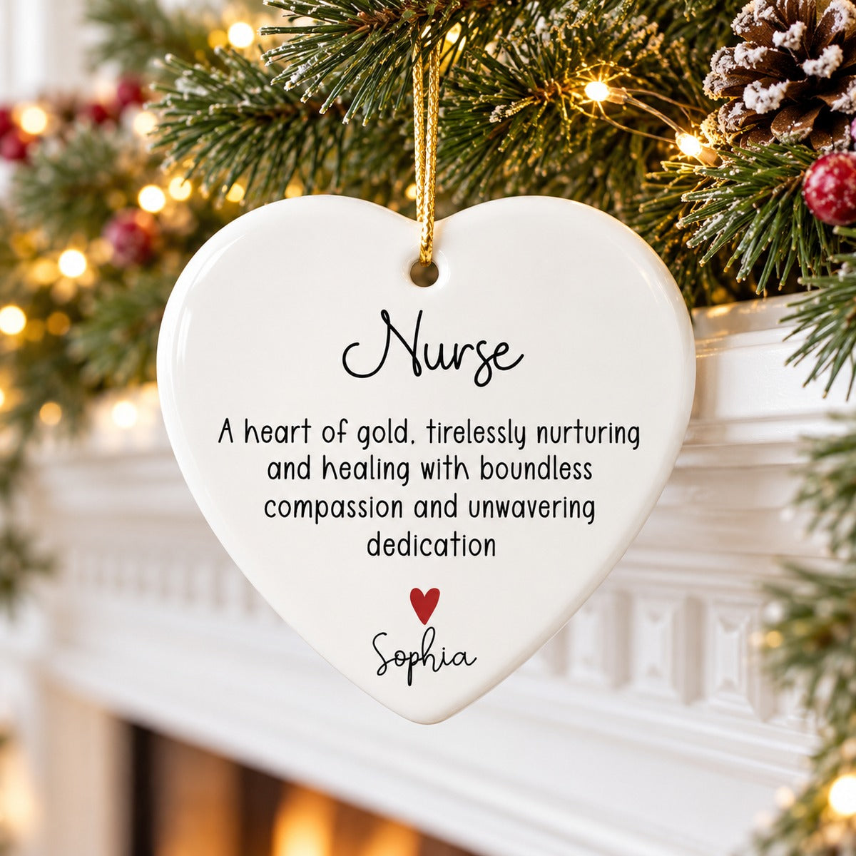 Heart of gold nurse ceramic ornament hanging from a Christmas mantel garland