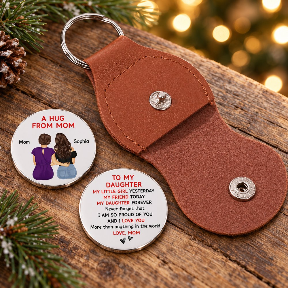 Personalized leather pocket hug from mom to daughter with printed metal coin in holiday setting