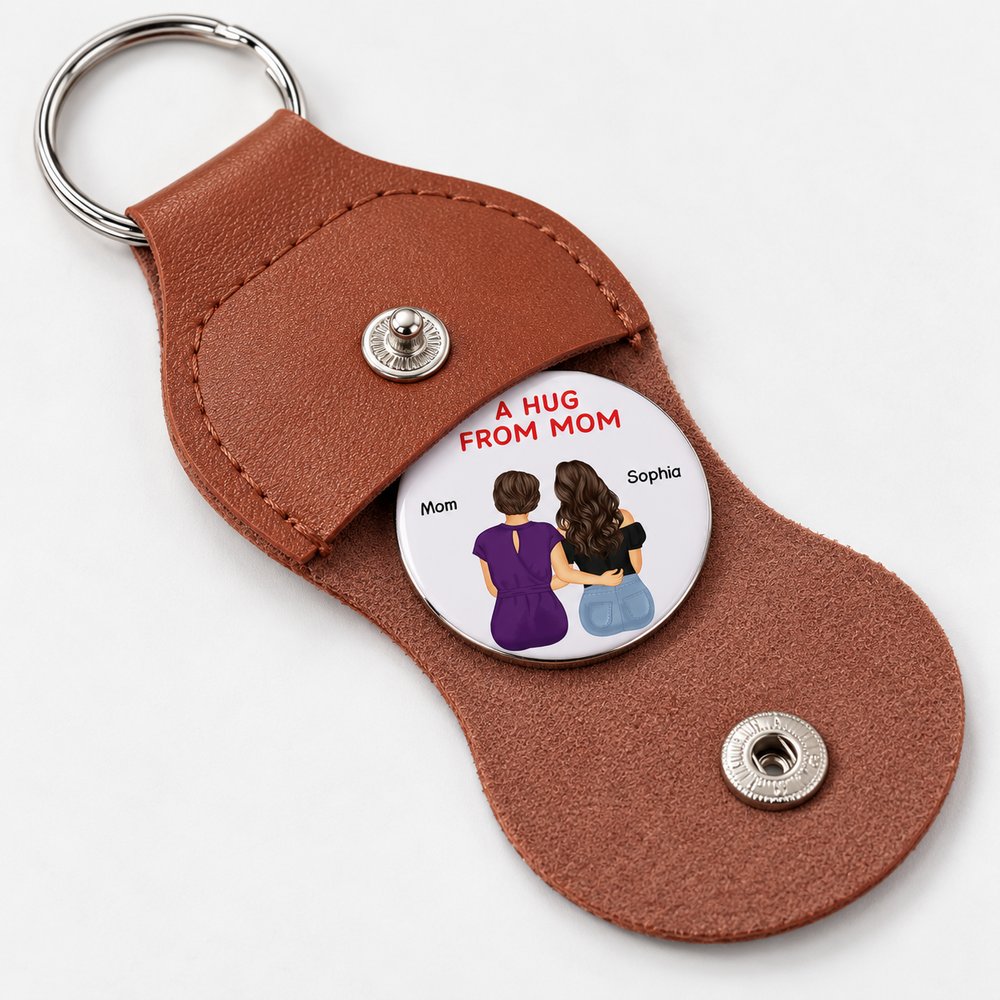 Close up detail of personalized leather pocket hug stitching and printed stainless steel token