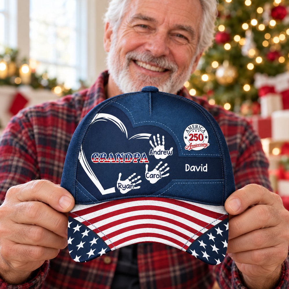 Grandpa holding personalized America 250th Anniversary handprints classic cap on Christmas morning