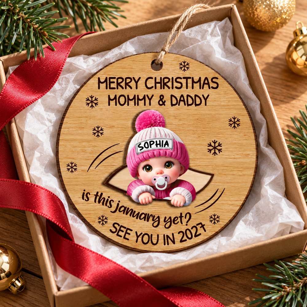 Personalized expecting baby 2-layer wood ornament in a holiday gift box with pine sprigs
