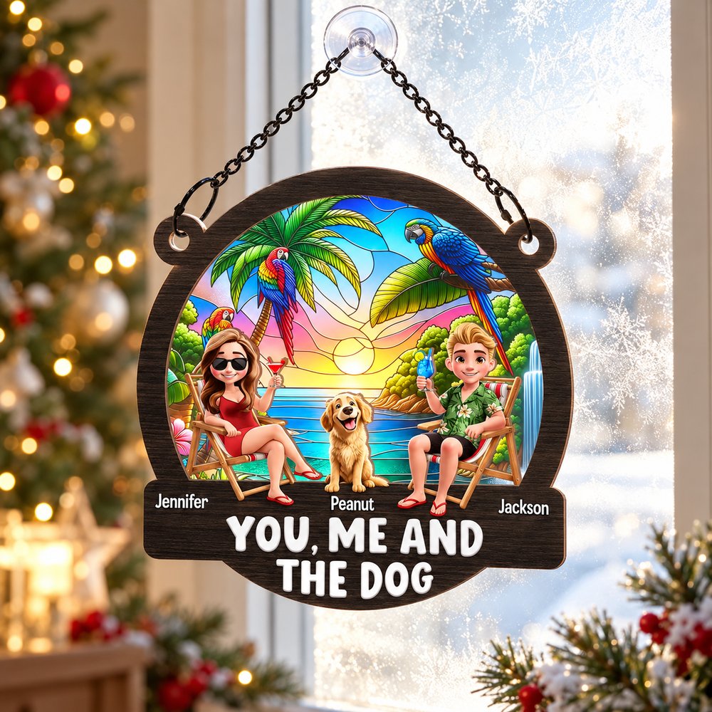 You Me And The Dog personalized window suncatcher hanging near a Christmas tree