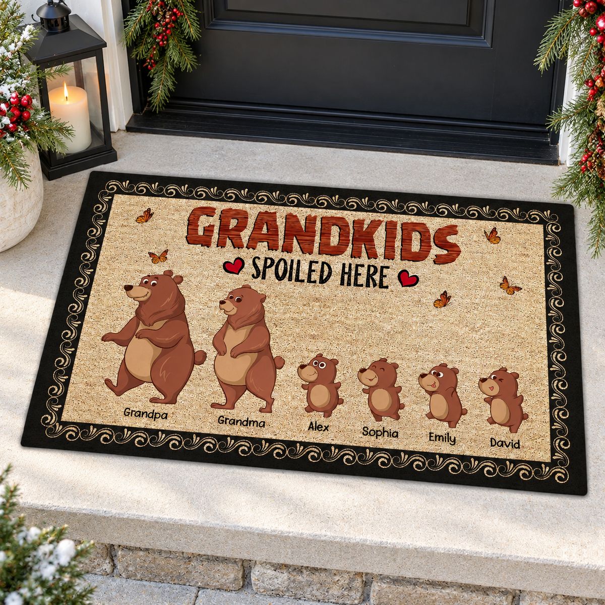 Personalized Bear Grandkids Spoiled Here doormat on a festive holiday front porch with pine garland