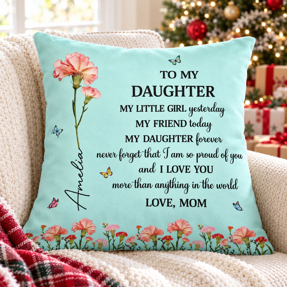 Personalized birth flower daughter pillow on armchair by Christmas tree
