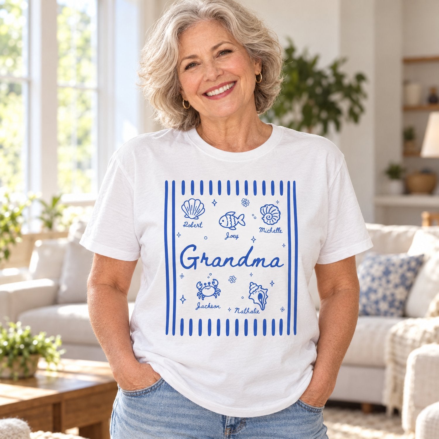 Grandma wearing white personalized blue retro summer t-shirt with sea creatures and grandkids names