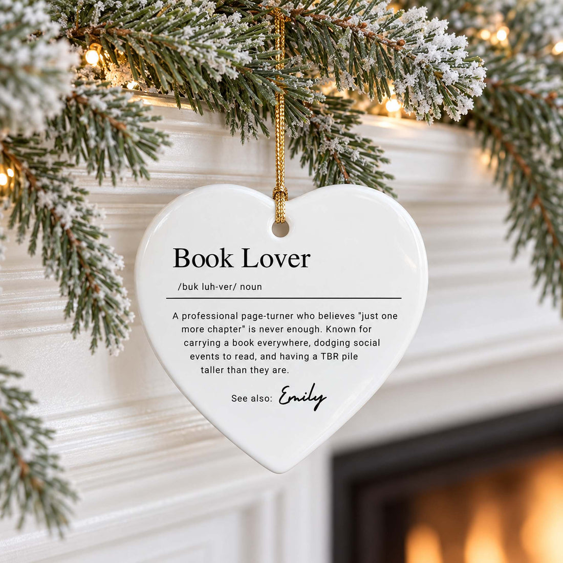 Heart-shaped Book Lover Definition ceramic ornament for Emily hanging on a holiday mantel garland