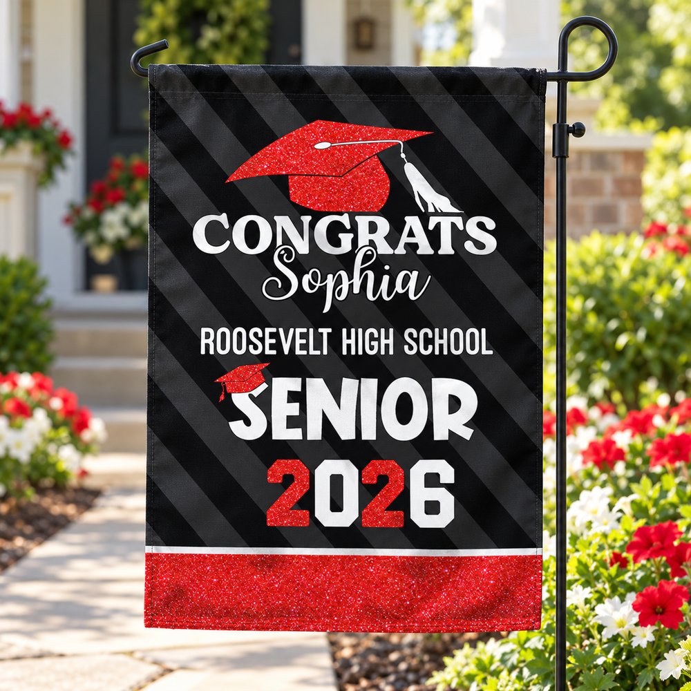 Personalized Senior 2026 graduation garden flag hanging on a black stand by a sunny front walkway