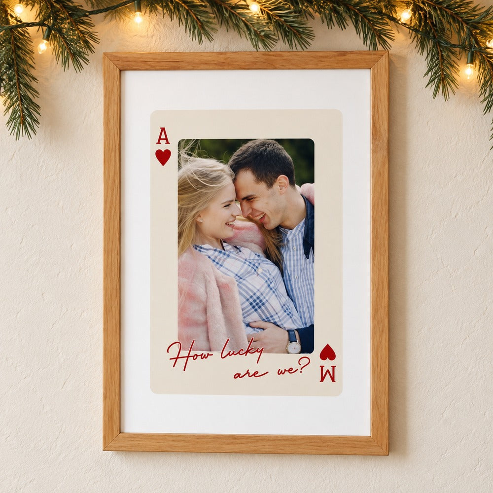 Personalized couple Ace of Hearts framed poster print on wall with holiday pine garland