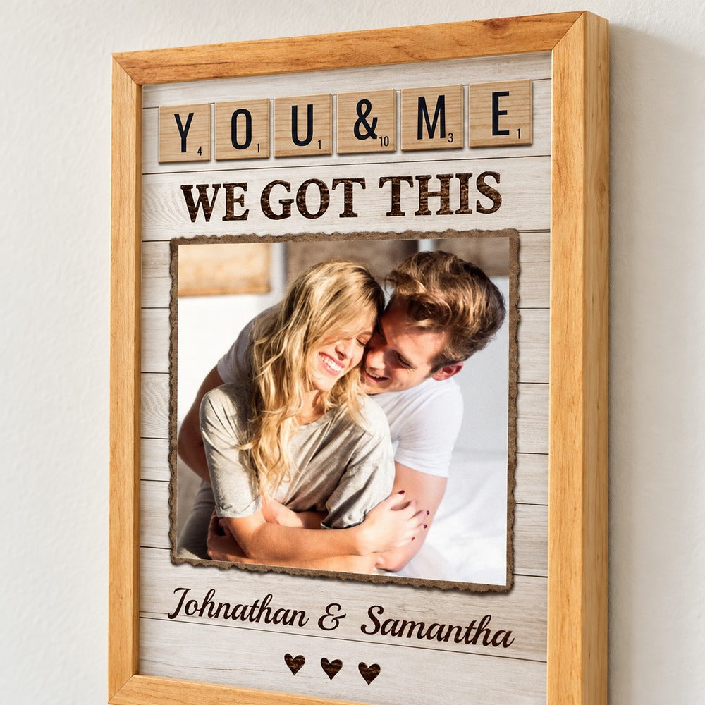 Close-up detail of personalized couple print showing wood frame corner and crisp printed texture