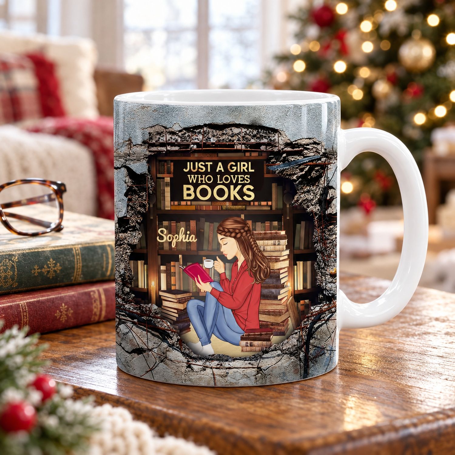 Custom book lover ceramic mug on side table with stacked books and holiday tree background