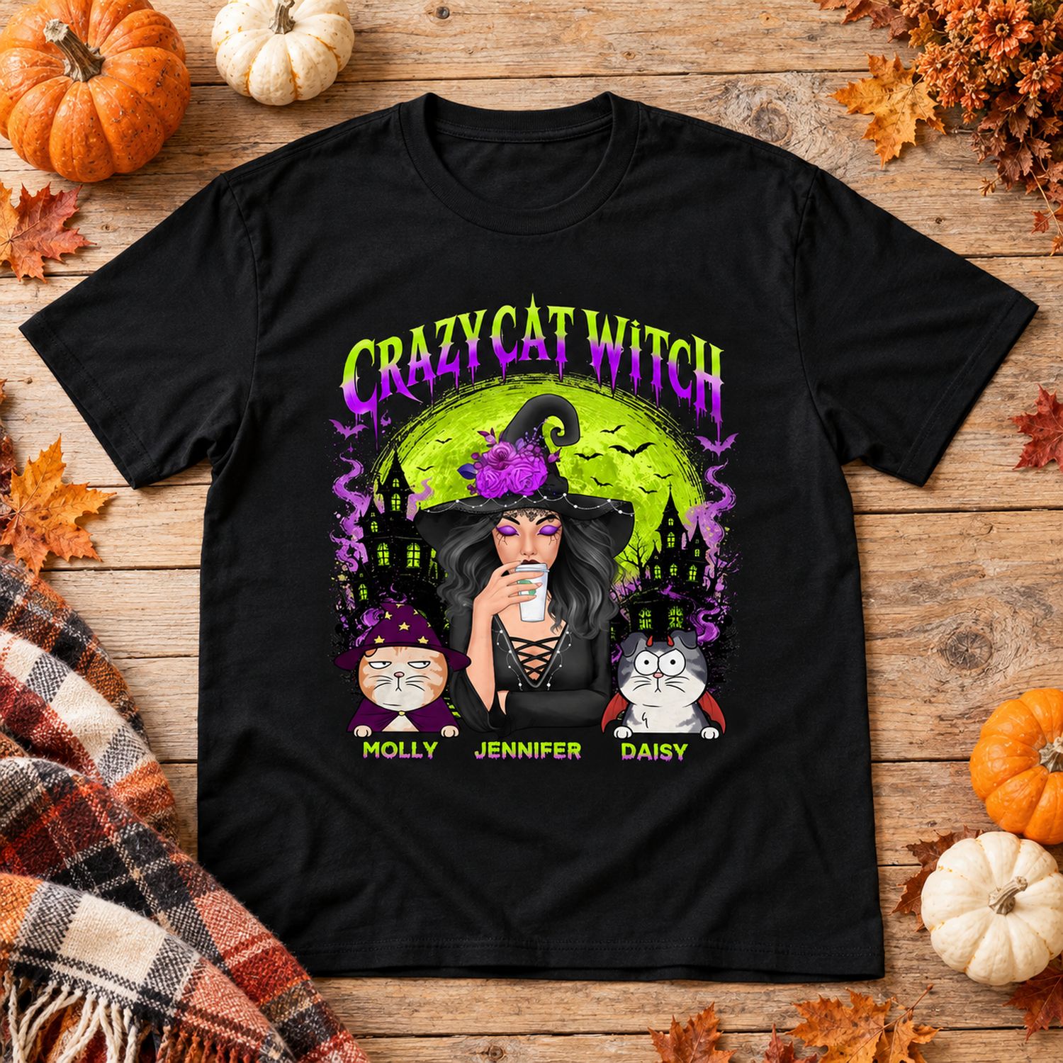 Crazy Cat Witch custom Halloween t-shirt flat lay with autumn pumpkins and leaves