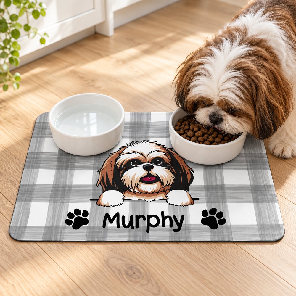 Custom dog plaid pet placemat in use on kitchen floor with Shih Tzu and bowls