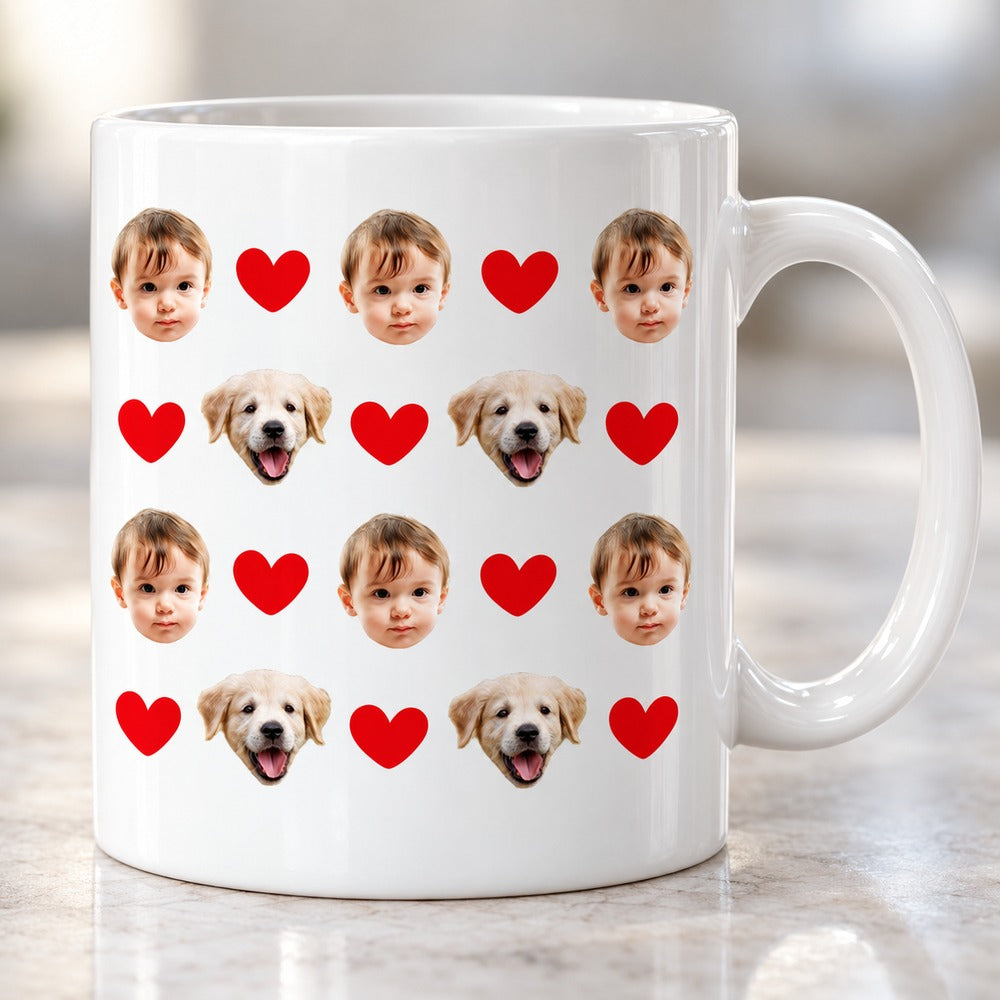 Close-up detail of custom baby face and red heart print on glossy ceramic mug