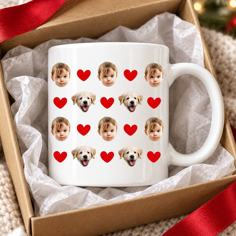 Personalized baby and dog photo mug in an open gift box with red ribbon