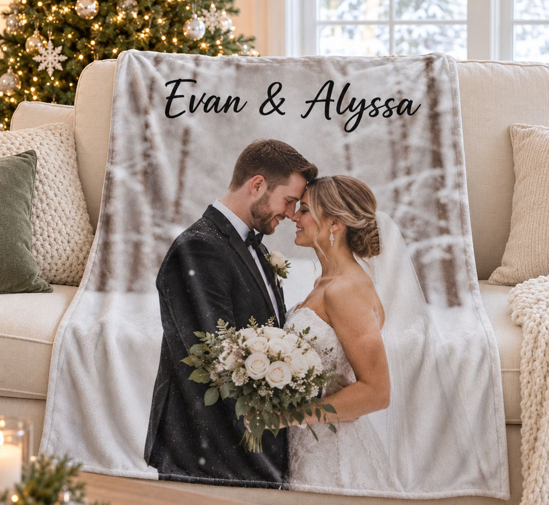 Custom Photo Couple Blanket draped on a cream sofa near a Christmas tree