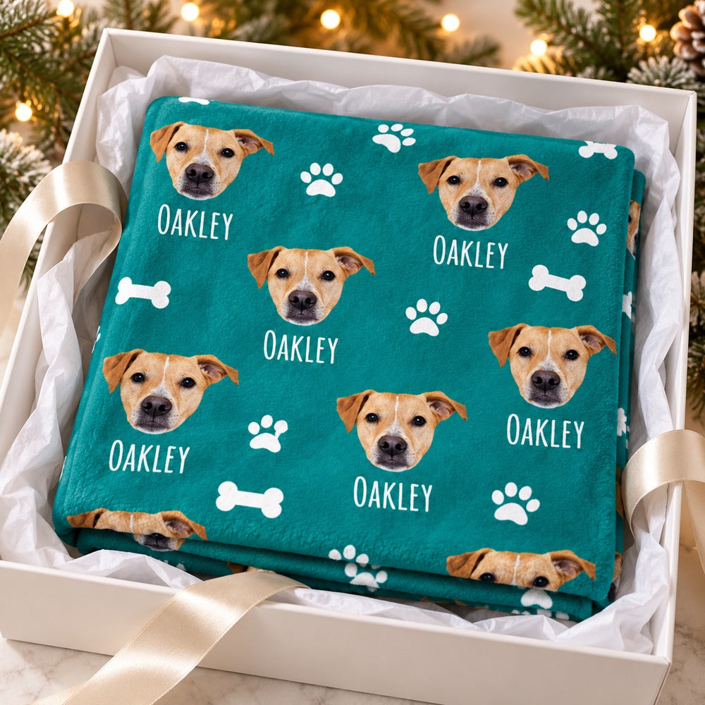 Personalized dog photo fleece blanket folded inside an open holiday gift box
