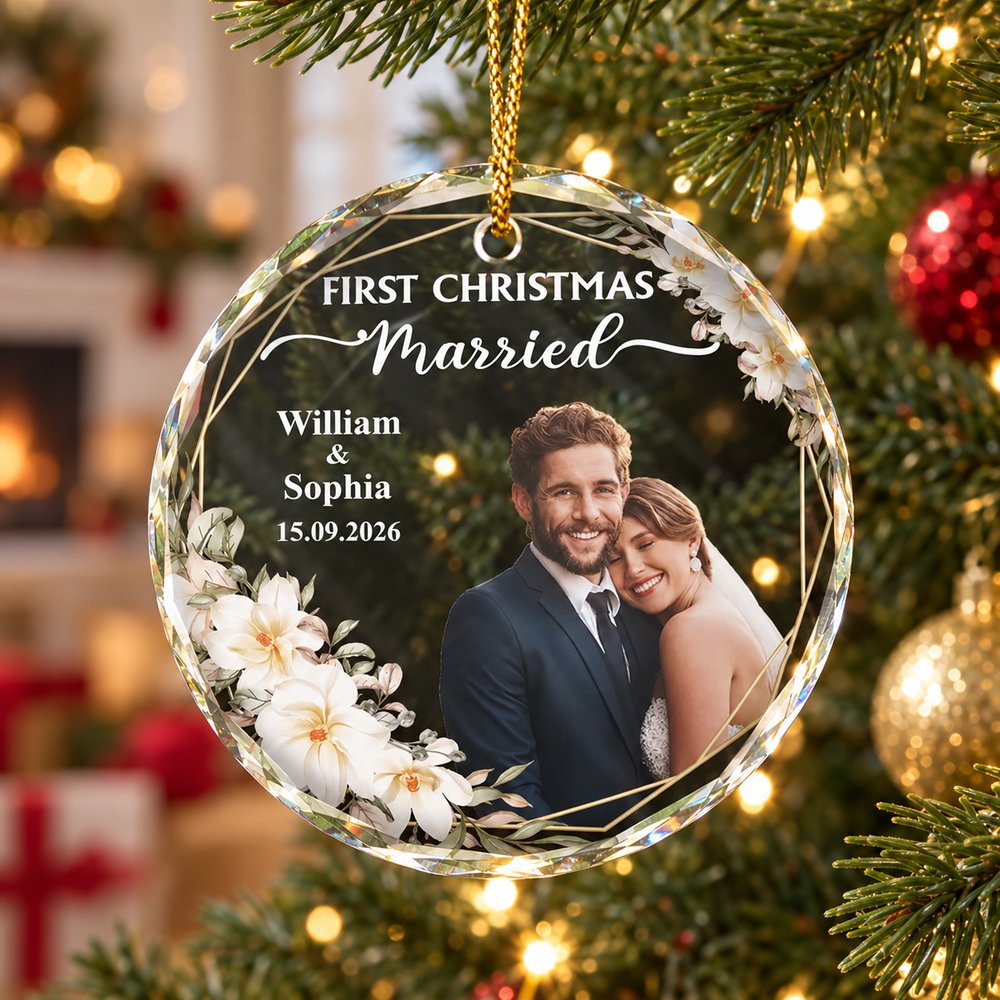 Personalized First Christmas Married circle glass ornament hanging on a decorated Christmas tree