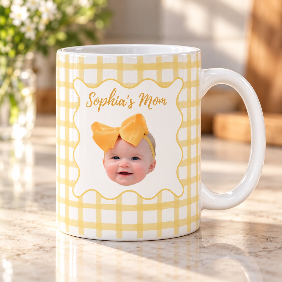 Close-up detail of the glossy ceramic print quality on the custom baby face mug