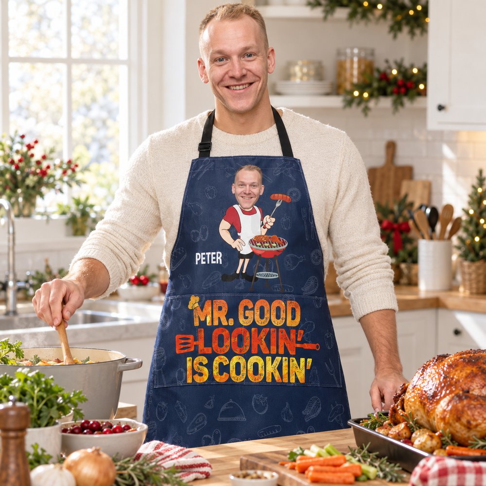 Man wearing personalized Mr Good Lookin Is Cookin photo apron while prepping food in a bright kitchen