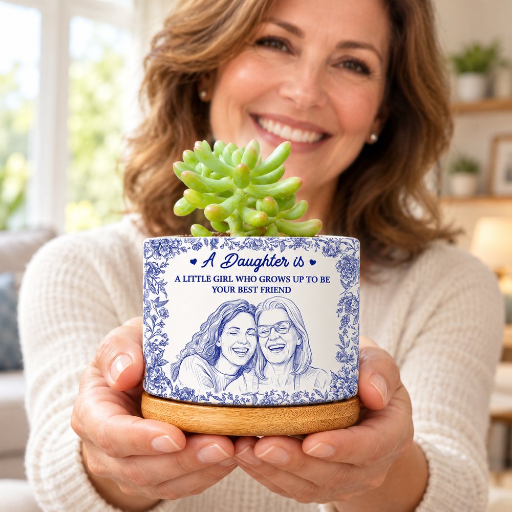 Mom holding her personalized daughter sketch ceramic plant pot with succulent