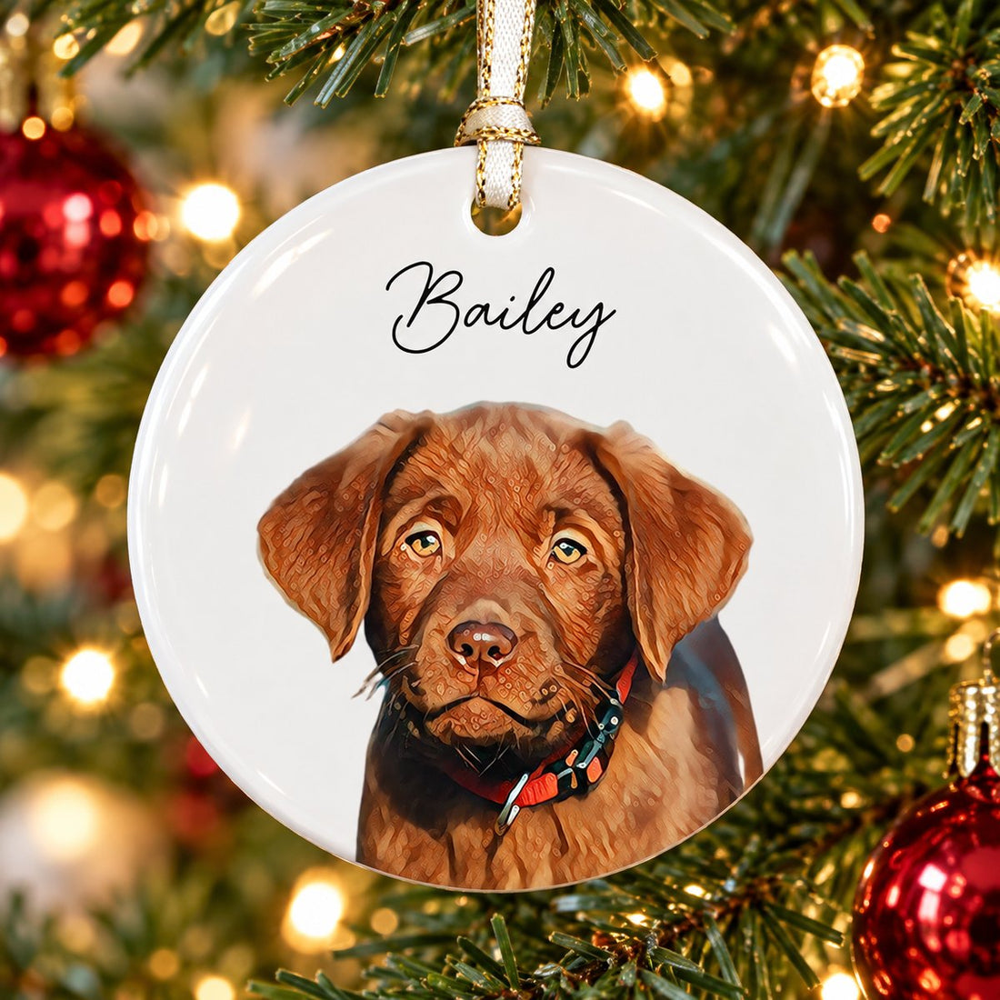 Custom photo pet portrait circle ceramic ornament hanging on a Christmas tree branch