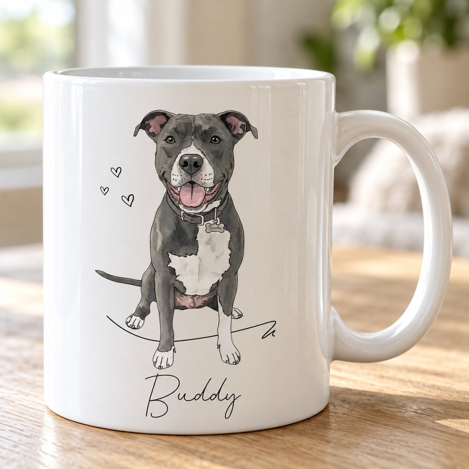 Close-up of the watercolor pet illustration and cursive name print on the glossy ceramic mug