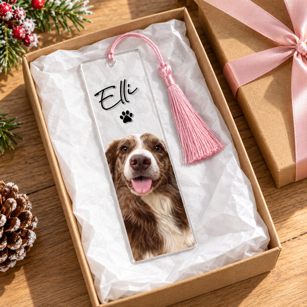 Personalized pet portrait acrylic bookmark with tassel inside an open holiday gift box