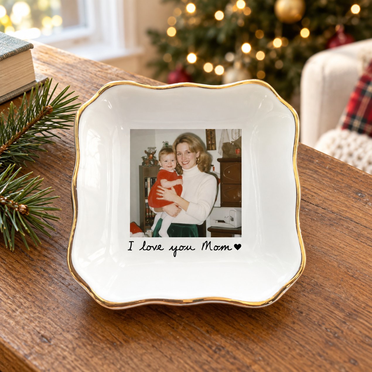 Personalized Mom photo trinket tray on a table with soft holiday pine and Christmas tree in background