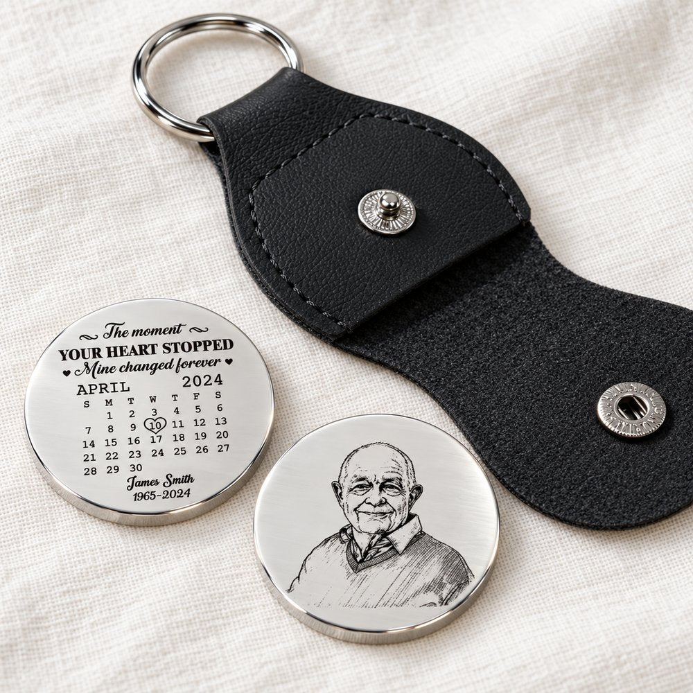 Macro closeup of custom sketch memorial stainless steel coin and stitched leather pocket hug case