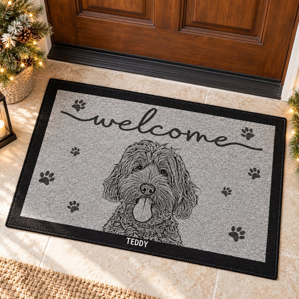 Personalized dog sketch doormat in a festive holiday entryway with pine decor